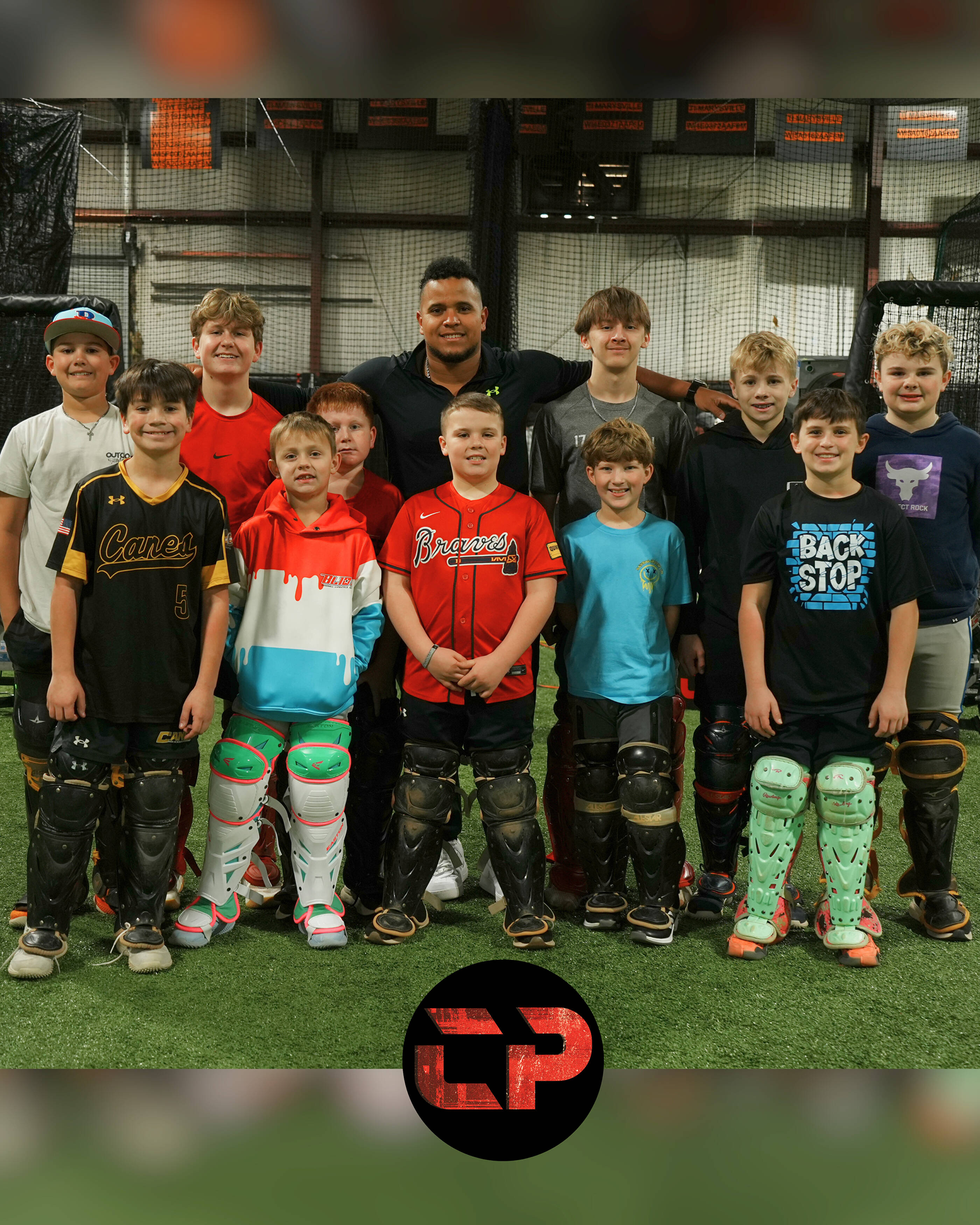 Andrés Ugarte with a group of CATCHPRO catchers after training